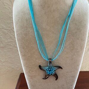 Blue and Brown Blown Glass Starfish Necklace/ Pendant on Blue Necklace Cord.
